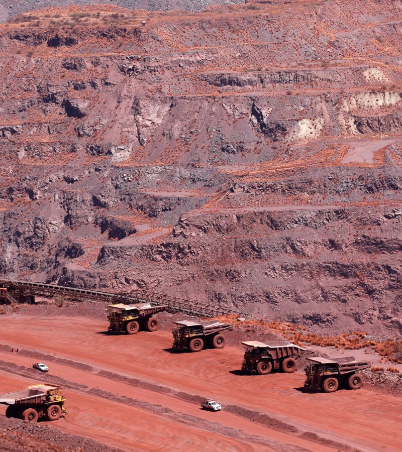 FILE PHOTO: Haul trucks are seen at Kumba Iron Ore, the world's largest iron ore mines in Khathu, Northern Cape province, South Africa, November 15, 2011. REUTERS/Siphiwe Sibeko